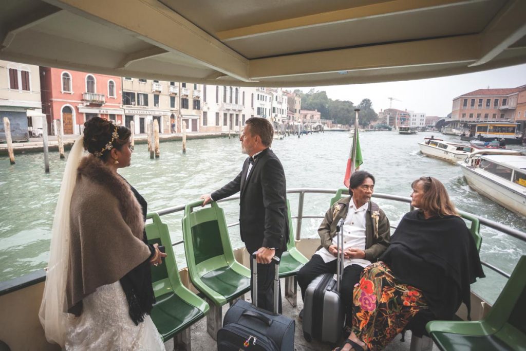 organizing-wedding-anniversary-travel-with-watter-bus-in-venice-italy