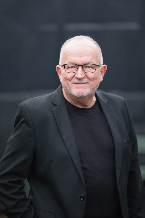 Professionelt erhvervsportræt i virksomhed København, taget af erhvervsportrætfotograf