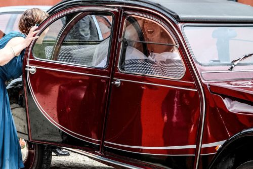 Bride and bridemaid in the car by Cristian Mihaila 